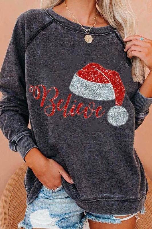 Damen-Weihnachtspullover – Lässiger Pullover mit dem Weihnachtsaufdruck „Believe“.